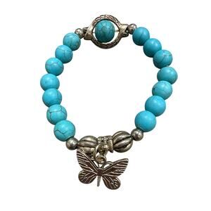 EUC Silvertone butterfly and turquoise color beaded stretch bracelet, charms